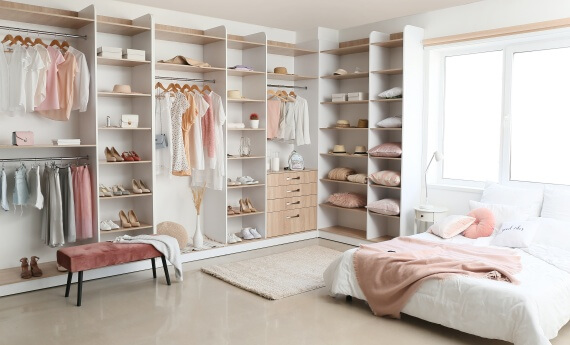 Tidy bedroom with pink accent